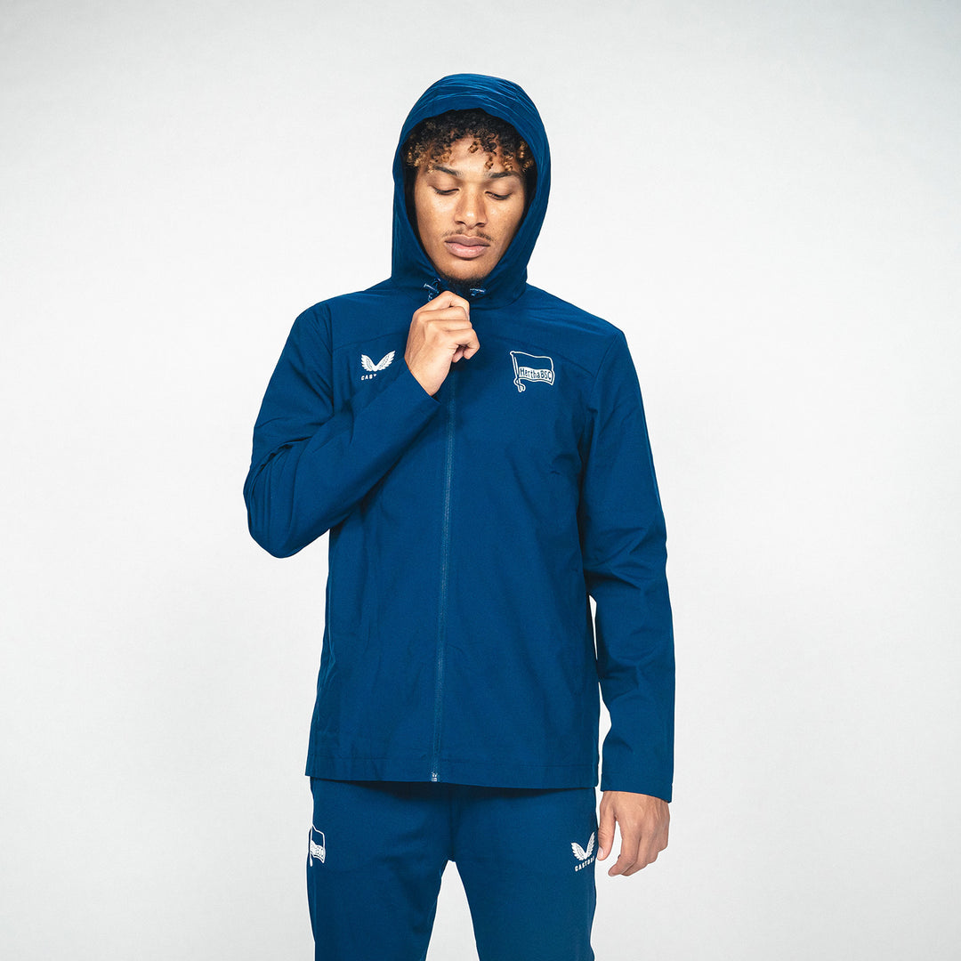 Regenjacke Castore navy Vorderansicht mit Kapuze 