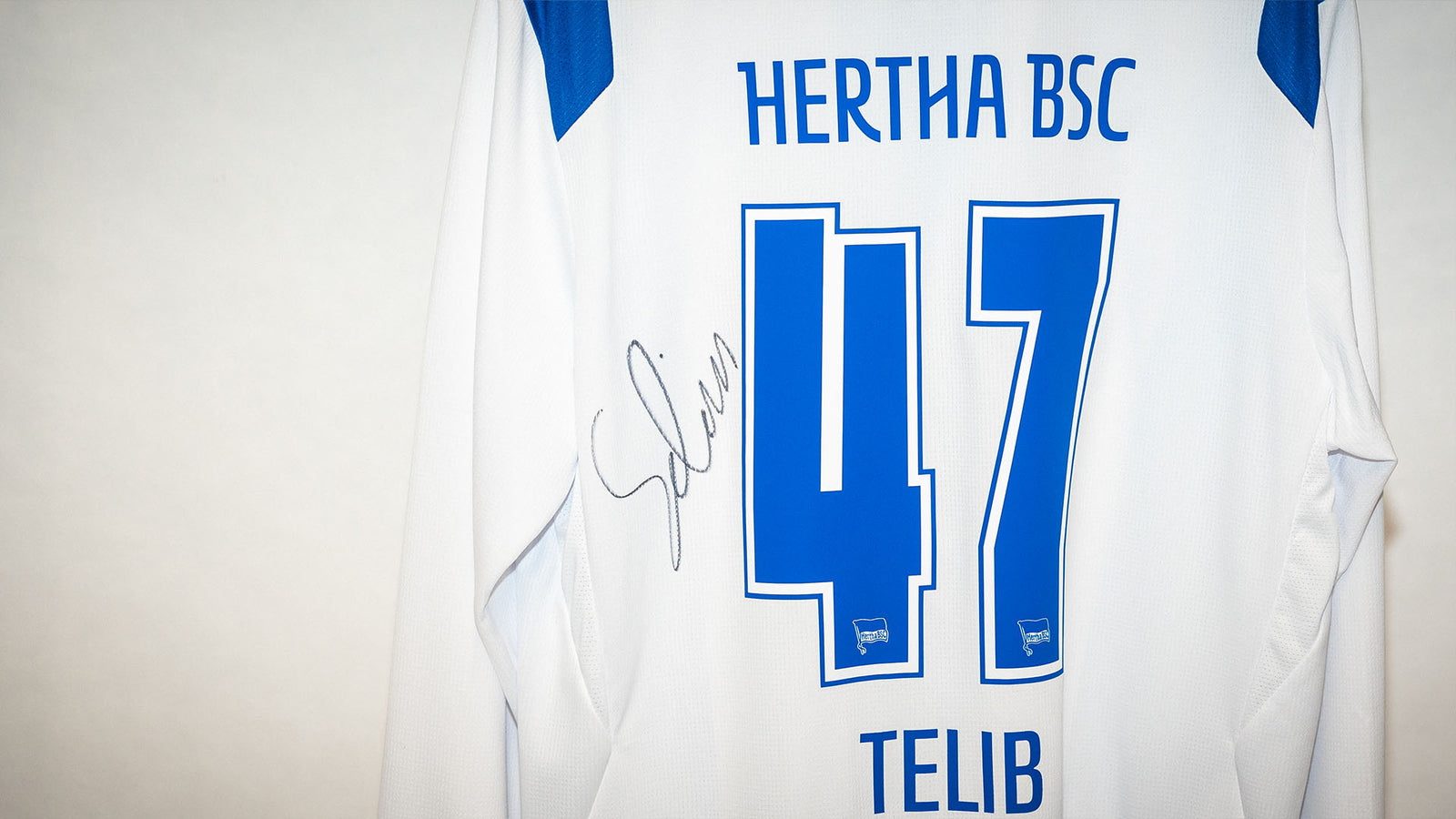 Hertha getragenes langarm Heimtrikot Selim Telib #47 Rückenansicht Detail